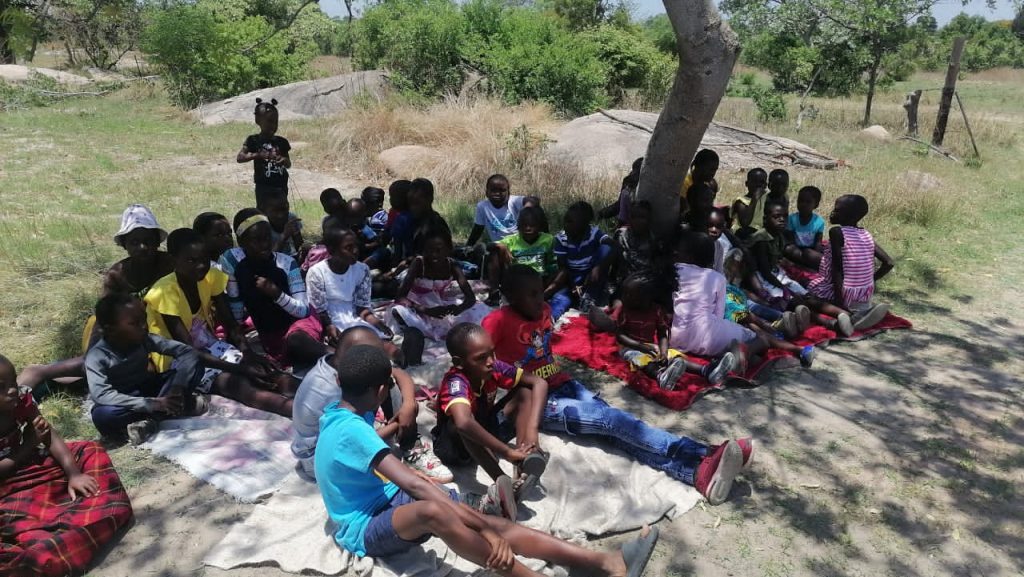 Children sitting - Child evangelism and care